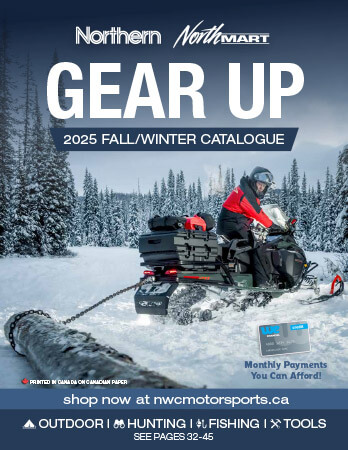 Cover of the 2025 Fall/Winter Catalogue. Man sitting on a ski-doo pulling a log behind that is attached with a chain. A nice blue sky in a clearing with trees in the background with the ground covered in snow